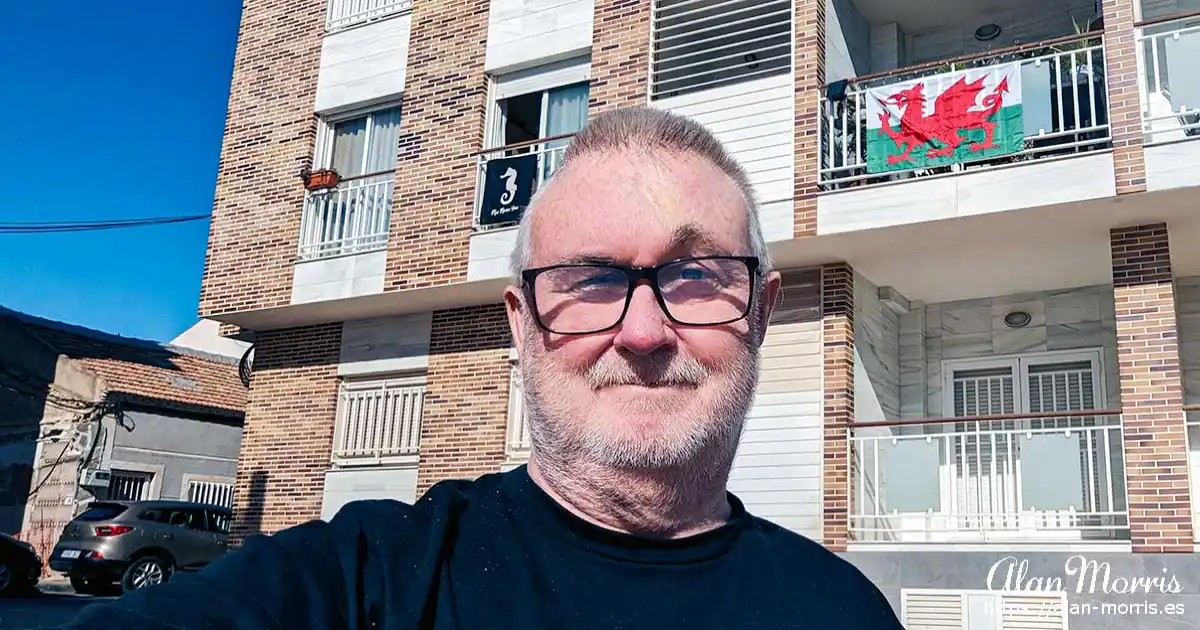 Alan Morris below his apartment in Los Alcazares.